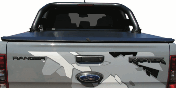 Ford Raptor with vinyl tonneau cover fitted over the load bed area.